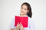 Asia Thai High School Student Uniform Beautiful Girl Read A Book Stock Photo