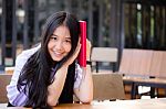 Asia Thai High School Student Uniform Beautiful Girl Read A Book Stock Photo