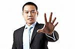 Asian Businessman Stop Gesture Stock Photo