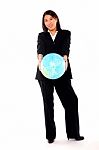 Asian Businesswoman With Globe Stock Photo