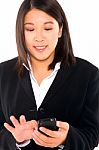 Asian Businesswoman With Mobile Stock Photo