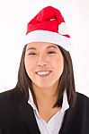 Asian Businesswoman With Santa Hat Stock Photo