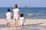 Asian Family On Beach Stock Photo