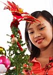 Asian Girl Enjoying Christmas Stock Photo