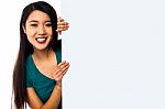 Asian Girl Holding Blank White Ad Board Stock Photo