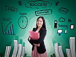 Asian Woman Smiling On Business Background Stock Photo