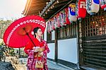 Asian Woman Wearing Japanese Traditional Kimono In Kyoto, Japan Stock Photo
