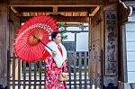 Asian Women Wearing Japanese Traditional Kimono Visiting The Beautiful In Kyoto Stock Photo