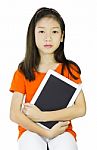 Asian Young Girl Is Holding Tablet Stock Photo