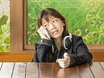 Asian Young Girl Using Mobile Phone Stock Photo