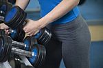 Athletic Woman  With Dumbbells Stock Photo