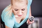 Attractive Blonde Sports Girl Lifting Dumbbell Doing Workout In Stock Photo