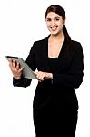 Attractive Businesswoman Working On Touch Pad Stock Photo