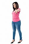 Attractive Casual Women Pointing Stock Photo