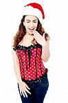 Attractive Lady Posing With Santa Cap On Stock Photo