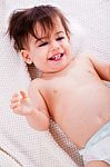 Baby Laughing After The Bath In A White Towel Stock Photo