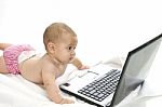 Baby Looking Laptop Stock Photo