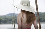 Back Of Beautiful Girl With Hat Stock Photo
