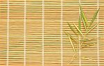 Bamboo Leaves On Bamboo Mat Stock Photo
