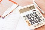 Bank Account Passbook With Pen, Calculator And Eyeglasses Stock Photo