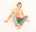 Bare Chested Man With Headphones Stock Photo