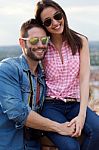 Beautiful And Smiling Couple In The City Stock Photo