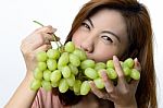 Beautiful Asian Woman With Grape Stock Photo