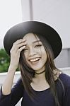 Beautiful Asian Young Woman Smiling On The City Stock Photo