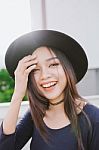 Beautiful Asian Young Woman Smiling On The City Stock Photo