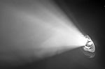 Beautiful Black And White Color Wide Lens Projector With Light Beam For Movie And Cinema At Night . Smoke Texture Spotlight . Screening For Multimedia . Abstract Background  Stock Photo