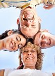 Beautiful Family. Heads Together Stock Photo