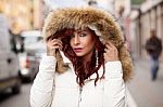 Beautiful Fashion Model In Fur Coat Stock Photo