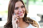 Beautiful Female Business Executive On Cell Phone Stock Photo