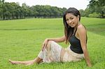 Beautiful Girl Relaxing In The Park Stock Photo