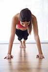 Beautiful Healthy Young Woman Doing Exercise At Home Stock Photo