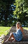 Beautiful Pregnant Woman In City Park Stock Photo