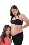 Beautiful Pregnant Woman With Her Daughter Stock Photo