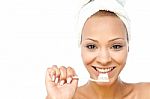 Beautiful Woman Brushing Her Teeth Stock Photo