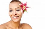 Beautiful Woman Face With Fresh Flower Stock Photo