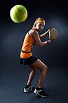 Beautiful Woman Playing Padel Indoor. Isolated On Black Stock Photo
