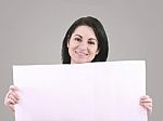 Beautiful Woman With A Banner Smiling Stock Photo