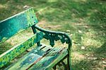 Beautiful Wooden Garden Chair In The Garden Stock Photo