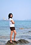 Beautiful Young Asian Woman On Beach Stock Photo