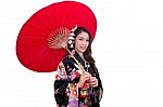 Beautiful Young Asian Woman Wearing Traditional Japanese Kimono With Red Umbrella Isolated On White Background Stock Photo