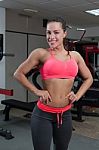 Beautiful Young Fit Woman Smiling And Posing At The Gym Stock Photo