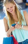 Beautiful Young Girl Having Fun With Smartphone Stock Photo