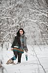 Beautiful Young Woman In A Sweater On A Winter Walk In A Wood Stock Photo