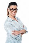 Bespectacled Lady Striking Pose Sideways Stock Photo