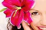 Big Flower In Woman's Hair Stock Photo