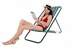 Bikini Woman Holding Touch Screen Tablet Device Stock Photo